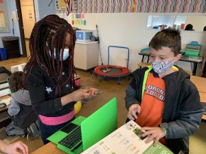 Fourth grade students in Mrs. Gasser's class work together to install hardware into a Pi-top computer