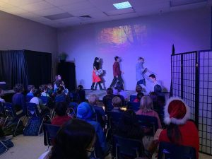 STEM high school students put on play for elementary school student