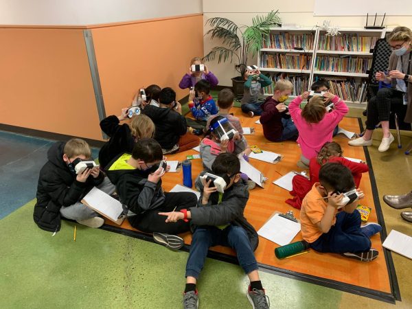 STEM elementary students using VR headsets