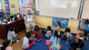 Jack Maher reads to STEM kids